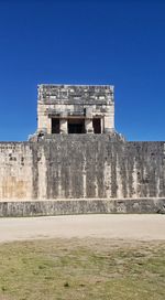 Low angle view of fort against blue sky