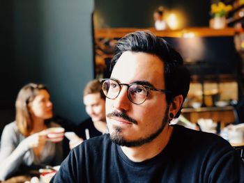 Portrait of young man looking away