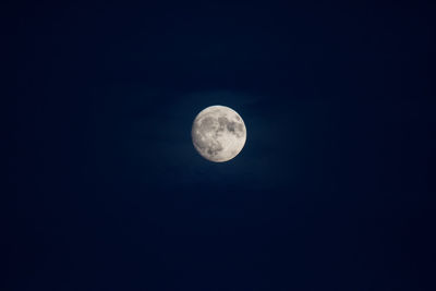 Scenic view of moon against clear sky at night