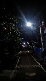 View of illuminated street at night