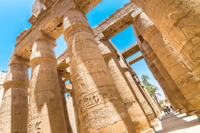 Low angle view of old temple against sky