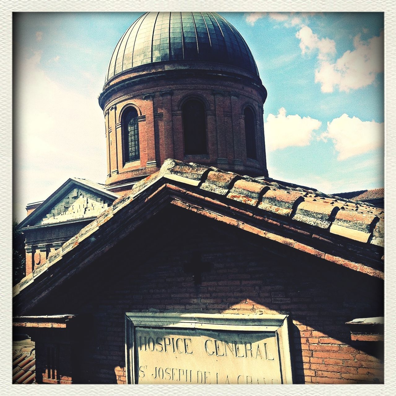 architecture, built structure, building exterior, transfer print, low angle view, sky, auto post production filter, place of worship, church, religion, cloud - sky, history, spirituality, cloud, facade, old, tower, cathedral