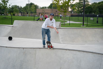 Portrait of man skateboarding on skateboard