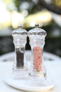 Close-up of glass of jar on table