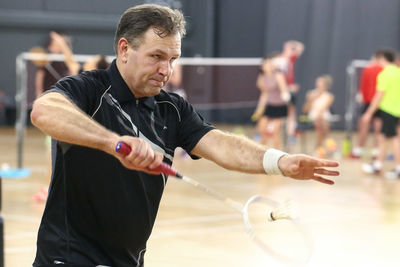 Man with arms raised