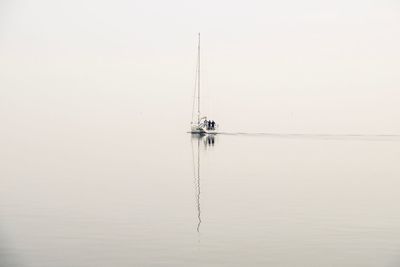 Ship in sea against sky