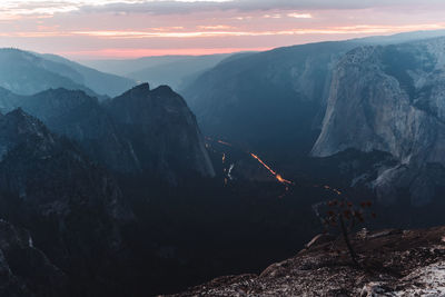 Scenic view of mountains against sky during sunset