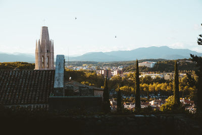 Buildings in city against sky