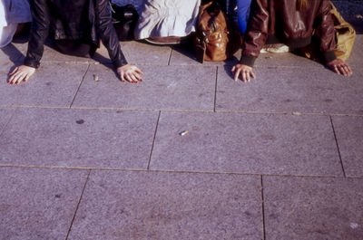 Low section of people on zebra crossing