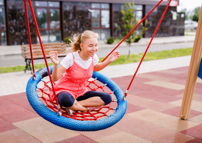Girl playing in playground
