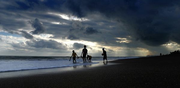 Scenic view of sea against cloudy sky