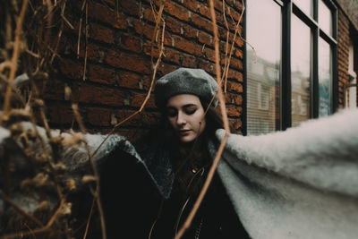 Close-up of young woman in winter