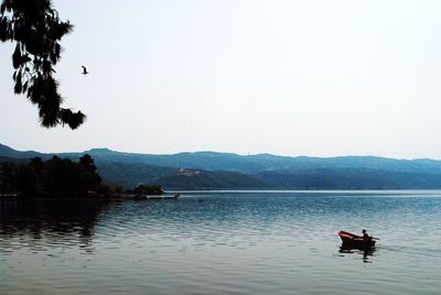 Scenic view of lake against clear sky