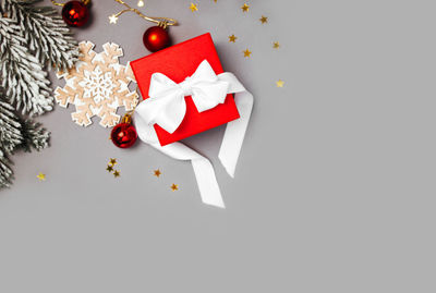 Directly above shot of christmas decorations on white background