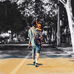 Young woman standing on street