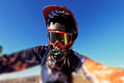 Rear view of man standing against sky