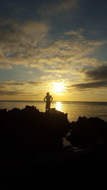 Scenic view of sea at sunset