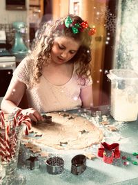 Girl preparing food on table