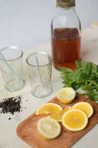 Close-up of ingredients for preparing lemon mint leaves