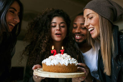 Group of young people celebrating birthday