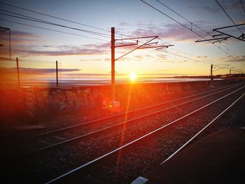 View of railway tracks at sunset