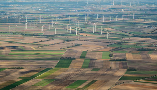 Aerial photography of austrian agriculture fields, wind turbines, infrastructure and landscapes