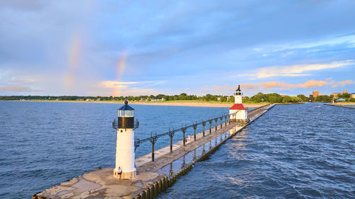 Pier over sea against sky