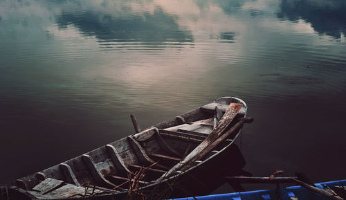 Boat moored on lake