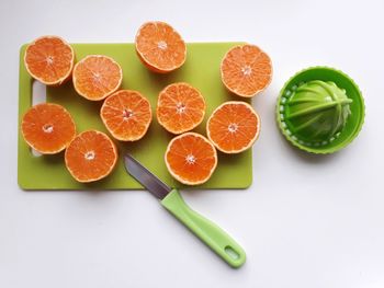 High angle view of orange fruits on table