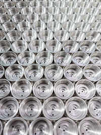 Shiny steel industrial production parts - close-up with selective focus