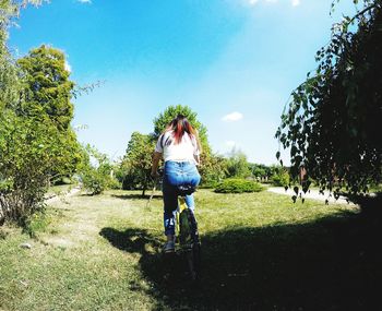 Full length of woman standing on field