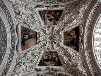 Low angle view of ornate ceiling of building