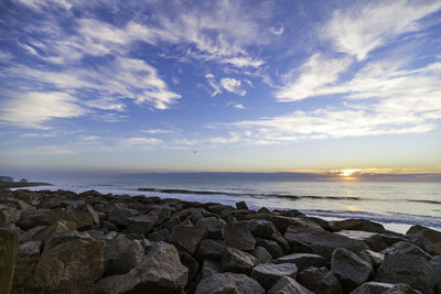 Scenic view of sea against sky during sunset