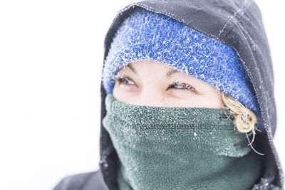 Close-up of woman wearing warm clothing during winter