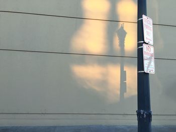 Low angle view of power lines against sky