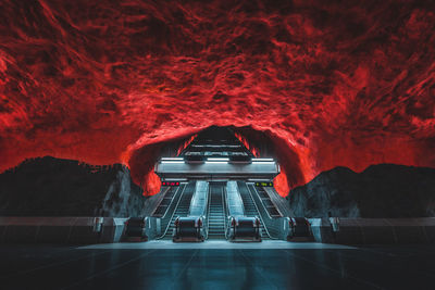 View of illuminated tunnel at night