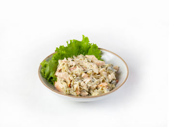 Close-up of food in bowl against white background