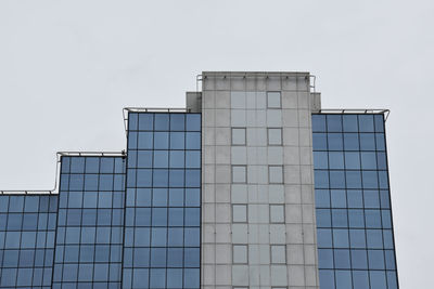 Low angle view of modern building against clear sky