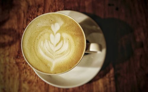 Directly above shot of cappuccino on table