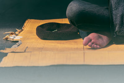 Close-up of hands working on table