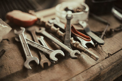 Old work tools in garage closeup.