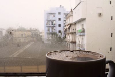 Close-up of coffee in glass window
