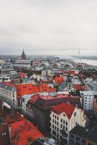 High angle view of buildings in city against sky