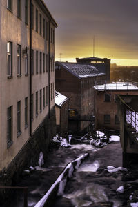 Buildings against sky during winter