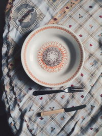 High angle view of plate on table