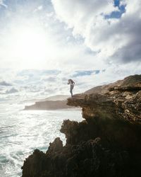 Silhouette of woman on beach