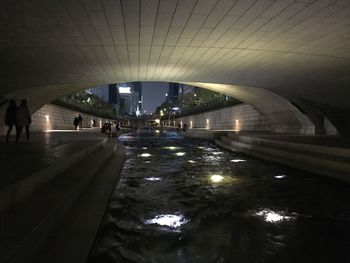 Bridge over river at night