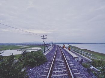 Railroad tracks against sky