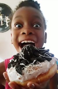 Close-up portrait of man with ice cream