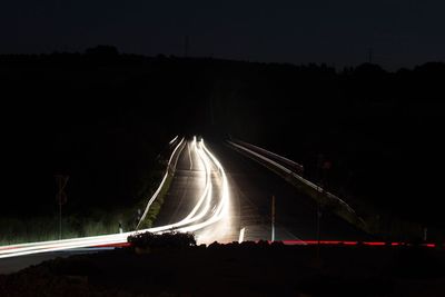 Light trails on road at night